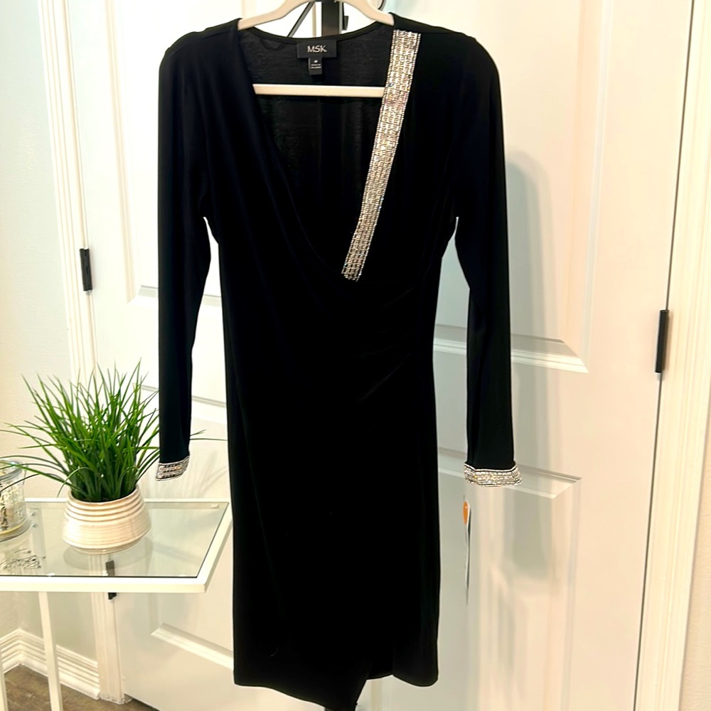 Beautiful black dress with rhinestone on front and sleeves